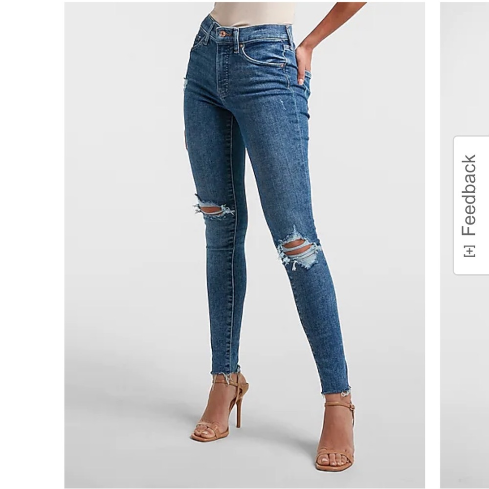 Express 
Mid Rise Dark Wash Ripped Raw Hem Skinny Jeans. Size 4 Regular